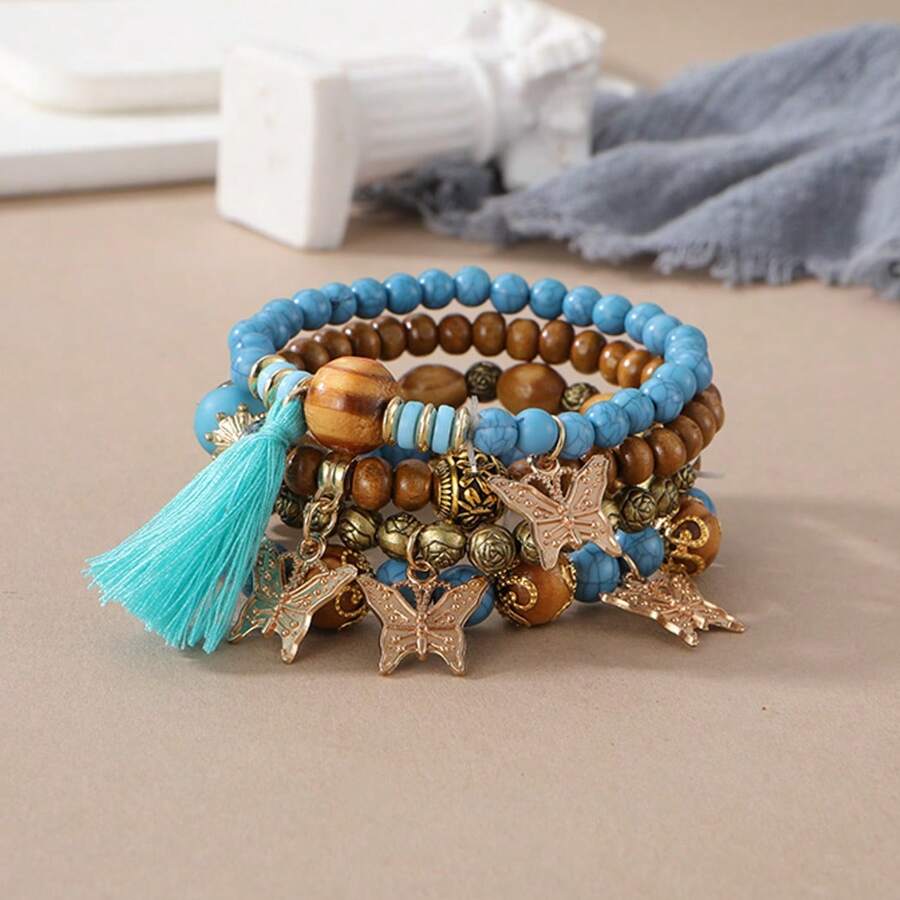 Set de 4 pulseras de estilo bohemio multicapa con cuentas y borlas, colgante de mariposa, joyería de moda como regalo