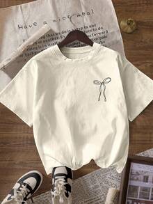 Camiseta de mujer de manga corta con cuello redondo, estampado gráfico de frase y lazo rosado - albaricoque claro - Ver 2