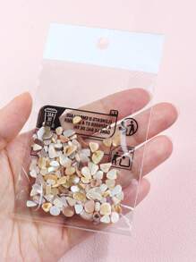 1 sac de 10g de cailloux de remplissage en copeaux de coquillages asymétriques, parfaits pour le remplissage de moules en silicone, fournitures d'artisanat DIY de bijouterie et remplisseurs de boules de résine
