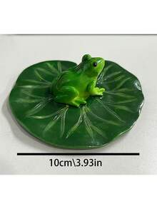 树脂青蛙雕像漂浮在荷叶上 - 独特的绿色青蛙，黑眼睛，白肚子，非常适合花园池塘、泳池装饰和季节性庆典装饰 | 动物雕塑 | 逼真的青蛙雕像，青蛙花园装饰
