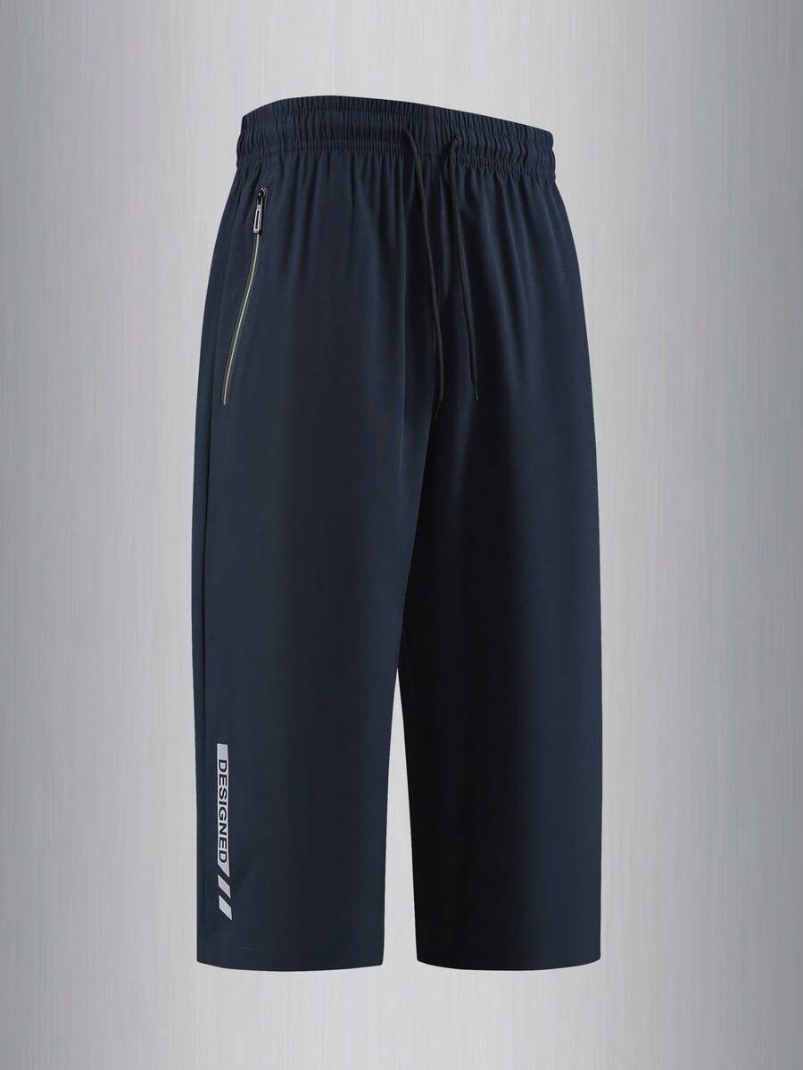 男士抽绳腰口袋拉链下摆印花休闲运动跑步健身户外七分裤，男友风，春夏