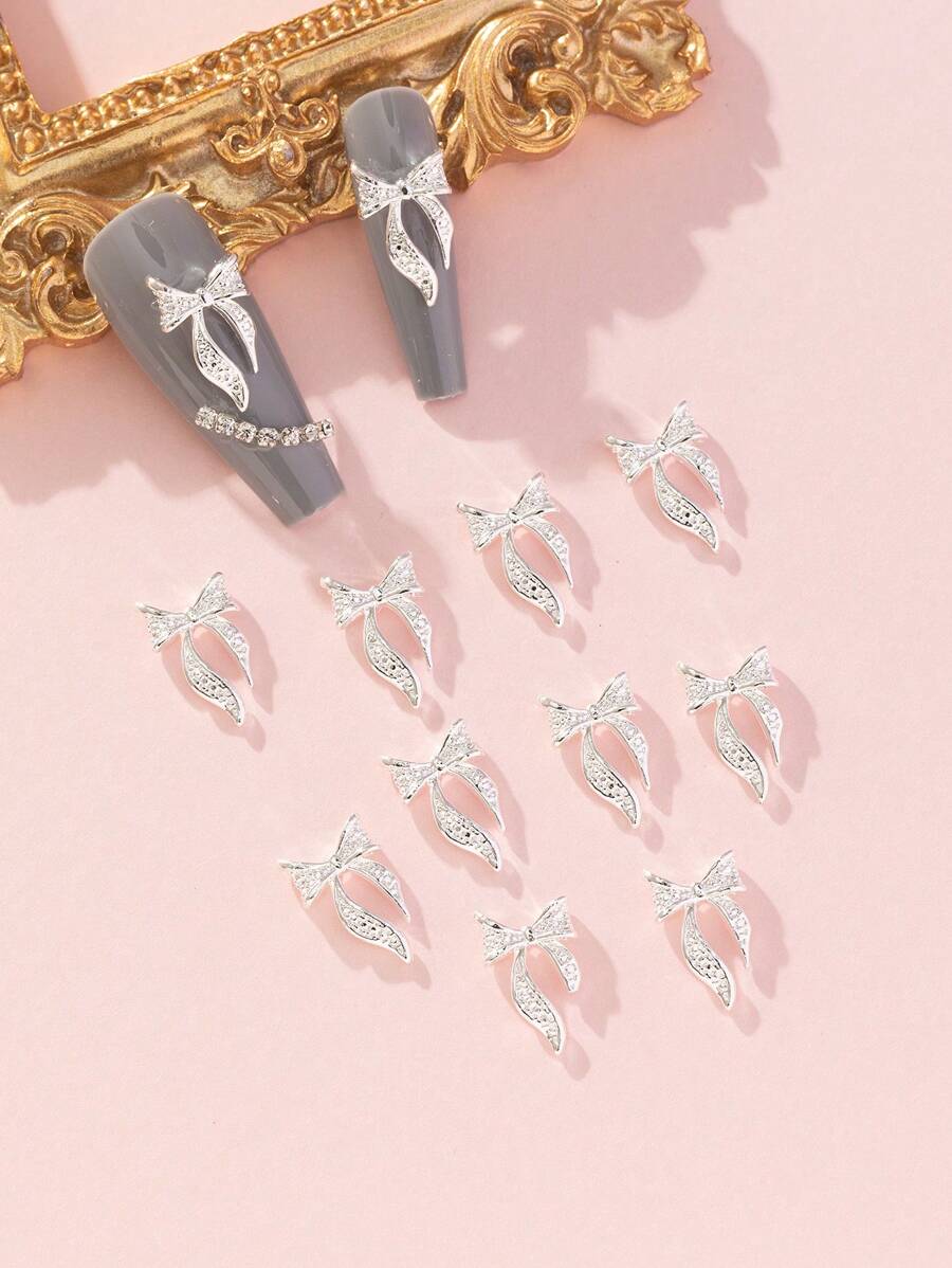 10pcs 0.9*1.5cm Silver Base Metal & Rhinestones Bowknot Nail Art Decoration