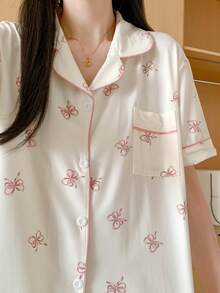 两件套女士睡衣套装，粉色装饰蝴蝶结图案，翻领单排扣，短裤和短袖，宽松，女士家居服睡衣