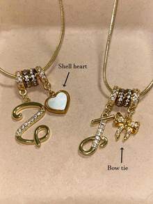 1件简约立方氧化锆心形宝石字母金色DIY项链，可定制简约字母名字项链，不锈钢吊坠项链，时尚、复古、休闲、个性化，独特礼物，适合送给女友、妈妈、家人、朋友、女儿，周年纪念日、情人节、母亲节、生日、毕业典礼、日常佩戴、婚礼、休闲场合，适合周年纪念日、生日、毕业典礼、舞会、派对等场合，定制时尚珠宝，精致浪漫，银色时尚