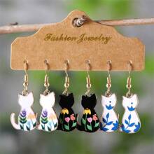 Aretes colgantes con diseño de gato de estilo floral salpicado y caprichoso, esmaltados a mano de metal con estilo de dibujos animados bohemio, accesorio de joyería adorable para mujer para uso diario, vacaciones, cumpleaños, fiesta, regalo de aniversario