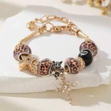 1 pieza Pulsera ajustable con dije de bola 8, dije de estrella y cruz, dije de tiempo y estampado de leopardo, estilo para parejas