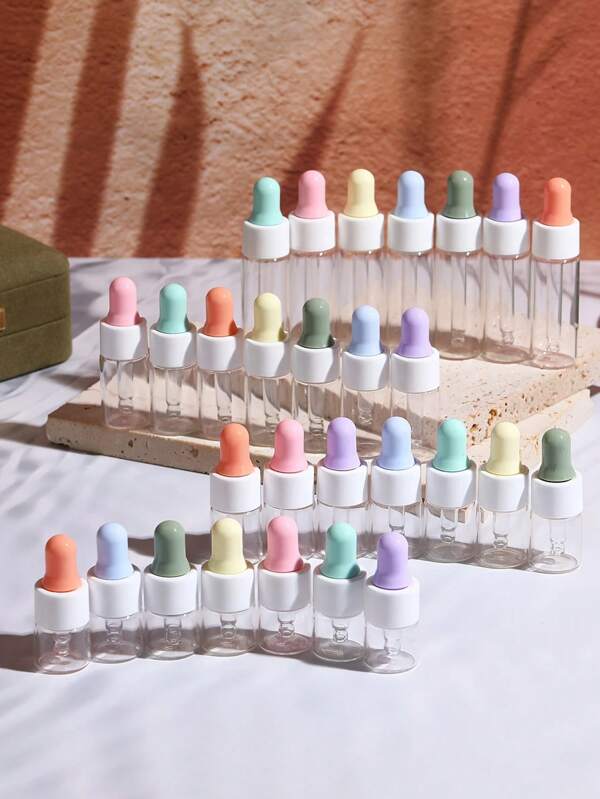 8 piezas Botellas cuentagotas de vidrio con tapas de colores - Botellas rellenables mini para aceites esenciales y muestras cosméticas para viajes, líquidos (Lavar a mano solamente)