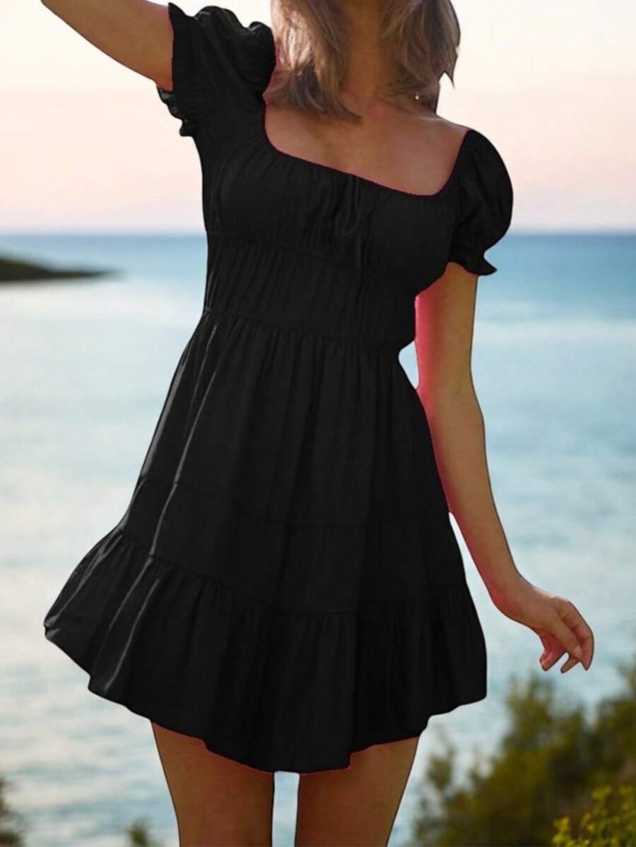 Vestido Corto con detalle de Nudo al frente. - Negro - Ver 1