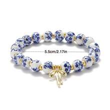 1pc Retro White&Blue Ceramic Bead Bracelet With Bow Pendant, Elastic, Suitable For Women's Daily Wear And Gifts