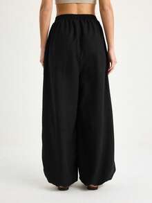 BIANCO LUCCI Women's Solid Color Elastic Waist Pocket Wide Leg Casual Loose Drawstring Pants - Black - View 2