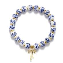 1pc Retro White&Blue Ceramic Bead Bracelet With Bow Pendant, Elastic, Suitable For Women's Daily Wear And Gifts