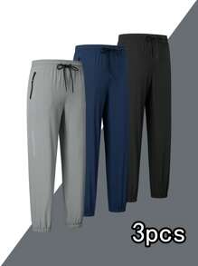 Set de 3 pantalones deportivos de secado rápido de unicolor para hombre, pantalones jogger acampanados con bolsillos y cremallera, adecuados para uso casual, entrenamiento y exteriores