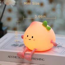 Cute Silicone Peach Night Light,3 Level Dimmable,Rechargeable And Portable LED Fruit Nightlight,Kawaii 7 Colors Tap Control Bedside Lamp For Bedroom,Christmas Gift,Birthday Gift - 1 - Xem 7
