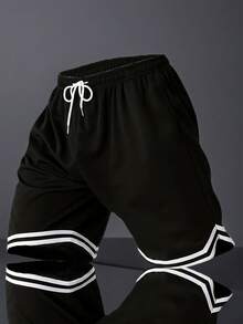 شورتات رياضية كاجوال سريعة الجفاف باللون الأحادي للرجال بخصر مخرم، مناسبة للياقة البدنية والجري وارتداء على الشاطئ - الأسود - مشاهدة 8