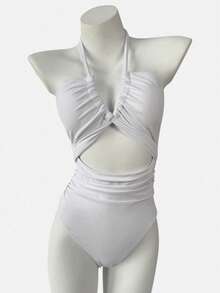 连体交叉挂脖镂空美背修身性感沙滩度假泳衣女