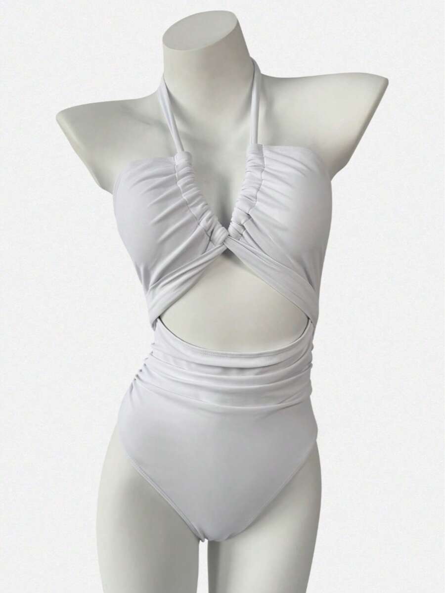 连体交叉挂脖镂空美背修身性感沙滩度假泳衣女