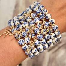 1pc Retro White&Blue Ceramic Bead Bracelet With Bow Pendant, Elastic, Suitable For Women's Daily Wear And Gifts