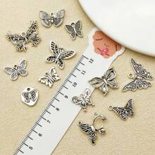 10/20 piezas surtidas de pendientes de aleación con diseño de mariposa antiguo plateado, adecuados para hacer collares, pendientes, llaveros y otros accesorios de joyería DIY