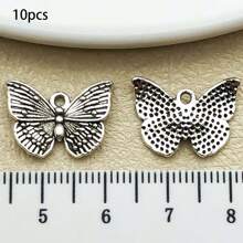 10/20 piezas surtidas de pendientes de aleación con diseño de mariposa antiguo plateado, adecuados para hacer collares, pendientes, llaveros y otros accesorios de joyería DIY