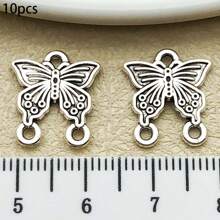 10/20 piezas surtidas de pendientes de aleación con diseño de mariposa antiguo plateado, adecuados para hacer collares, pendientes, llaveros y otros accesorios de joyería DIY