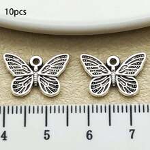 10/20 piezas surtidas de pendientes de aleación con diseño de mariposa antiguo plateado, adecuados para hacer collares, pendientes, llaveros y otros accesorios de joyería DIY