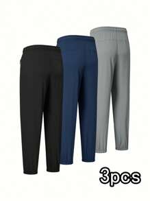 Set de 3 pantalones deportivos de secado rápido de unicolor para hombre, pantalones jogger acampanados con bolsillos y cremallera, adecuados para uso casual, entrenamiento y exteriores