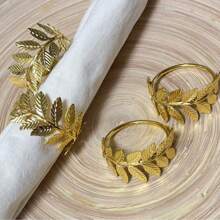 2/6pcs, National Day Of Saudi Arabia Four Seasons Roll Leaf Napkin Ring, Suitable For Wedding Parties, Event Celebrations, Rural Dinners, Outdoor Camping, Birthday Party Table Decoration Napkin Ring, Hotel Opening Cross Leaf Napkin Buckle, Golden Napkin Ring, Simple Leaf Napkin Ring Mouth Cloth Ring