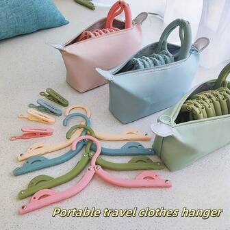 15 Piece Portable Travel Hanger Set With Storage Bag - Featuring A Polished Plastic Surface And Space Saving Design, Including 8 Foldable Hangers And 6 Clips, Suitable For Business Travel And Dormitory Use