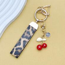 TTOBS 1pc Exquisitely Crafted Leopard Print Leather Car Key Chain With Adorable Cherry Pendant - , Fashionable And Multi-Functional Backpack Keychain - The Perfect Accessory For Backpacks. The Perfect Valentine's Day Gift, Also An Ideal Gift For Your Beloved Girlfriend.