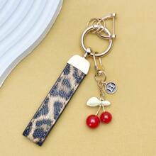 TTOBS 1pc Exquisitely Crafted Leopard Print Leather Car Key Chain With Adorable Cherry Pendant - , Fashionable And Multi-Functional Backpack Keychain - The Perfect Accessory For Backpacks. The Perfect Valentine's Day Gift, Also An Ideal Gift For Your Beloved Girlfriend.