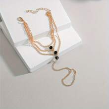 1pc Fashionable Vintage Black Wheel Bead Multi-Layer Rings Chain Bracelet
