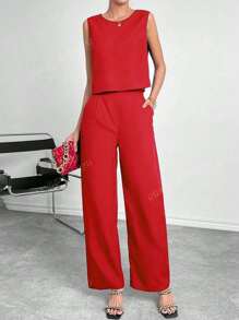 2 Stücke Frühling/Sommer 2025 Europäischer und Amerikanischer Mode Damen einfarbiges minimalistisches Pendler-Set, Rundhals-ärmelloses Crop Top kombiniert mit hochbundigem weitem Beinhose mit Taschen