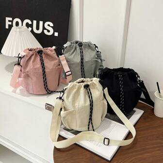 女士简约抽绳封口水桶单肩包，轻便休闲斜挎包，适合户外使用