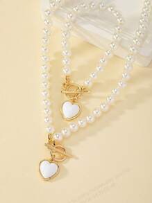 1 set de accesorios de perlas, juego de collar y pulsera con colgante en forma de corazón, elegante para ir al trabajo/citas, que realza el encanto de la mujer
