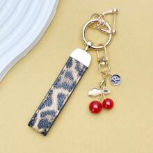 TTOBS 1pc Exquisitely Crafted Leopard Print Leather Car Key Chain With Adorable Cherry Pendant - , Fashionable And Multi-Functional Backpack Keychain - The Perfect Accessory For Backpacks. The Perfect Valentine's Day Gift, Also An Ideal Gift For Your Beloved Girlfriend.