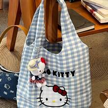 Sanrio Hello Kitty Kitty Cat Canvas Tote Bag Handheld Single Shoulder Commuting Bag For Work And School With Large Capacity For Carrying Books,Hello Kitty, Cinnamoroll,Pochacco 1pc Supply List Japanese Kt Cat Cartoon Hello Kitty Canvas Bag Small Fresh Shoulder Bag Class Hand-Held Canvas Bag, Cute Cartoon Large Capacity Handbag Shopping Storage Bag Tutoring Bag Small Gift Prizes,Birthday Gift,Makeup Bag,Hello Kitty Items