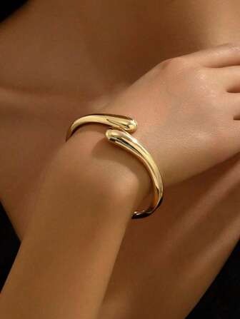 1 pieza Brazalete elástico asimétrico de metal dorado pulido, versátil y de moda, adecuado para eventos y uso diario