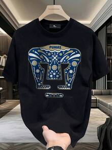 Black Pumas UNAM Logo Graphic T - Shirt (Blue Pattern) - Black - View 1