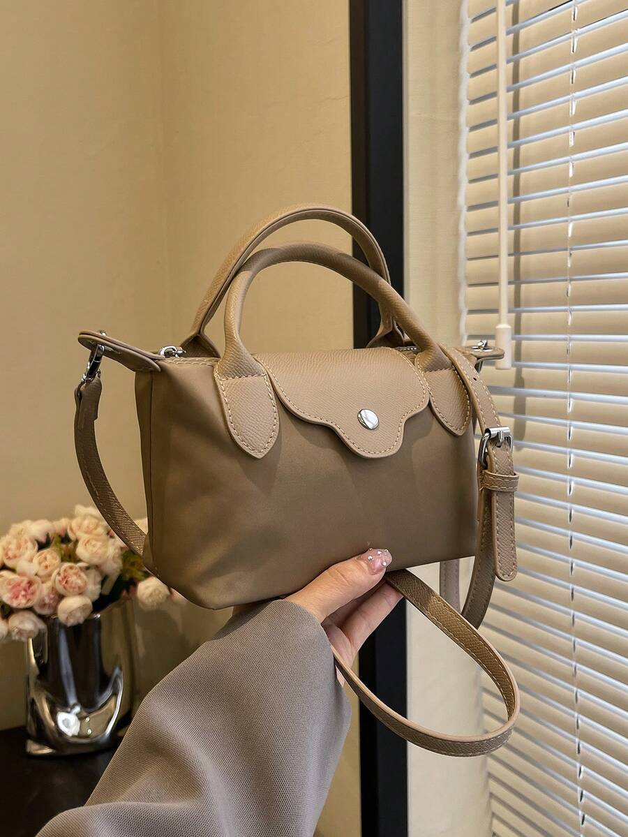 Túi xách nữ thời trang thường ngày, kiểu dáng hình bánh bao, phối màu đa năng, chất liệu nylon, thiết kế tối giản, có dây đeo vai tháo rời, phù hợp cho thanh thiếu niên, sinh viên đại học, người trẻ đi làm, văn phòng, trường học, công sở và đi lại.