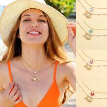 2 Stücke Sommer Halsketten Set, Strand Halskette für Frauen, verstellbare mehrlagige Halskette mit Kunstmuschel- und Kunstperlendesign. Nicht fixierte Sommer Ozean Halskette