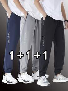 Set de 3 pantalones deportivos de secado rápido de unicolor para hombre, pantalones jogger acampanados con bolsillos y cremallera, adecuados para uso casual, entrenamiento y exteriores