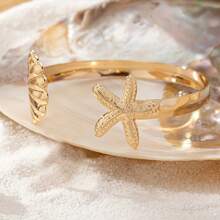 Pulseira de punho estilo estrela do mar e concha, estilo férias de praia, estilo europeu e americano, adequada para uso diário por mulheres