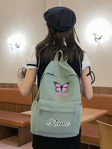 定制健身背包，可印上个性化姓名或节日祝福。开学季新品，休闲百搭的可爱蝴蝶印花，男女皆宜。尼龙拉链材质，适合大学生、高中生、初中生和小学生。您可以定制自己的姓名、字母、幸运数字等。送给朋友、女儿的生日礼物、纪念包、圣诞礼物、新年礼物等。 - 粉蝴蝶文本2 - 查看 6