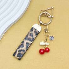TTOBS 1pc Exquisitely Crafted Leopard Print Leather Car Key Chain With Adorable Cherry Pendant - , Fashionable And Multi-Functional Backpack Keychain - The Perfect Accessory For Backpacks. The Perfect Valentine's Day Gift, Also An Ideal Gift For Your Beloved Girlfriend.