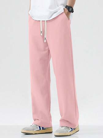 男士抽绳腰口袋休闲直筒针织运动裤，春秋季