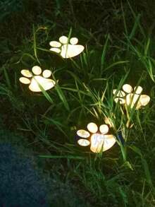 4个太阳能狗爪LED灯，爪印造型太阳能户外灯，带智能传感器，适用于猫狗、宠物花园小径的景观照明，暖白/白光LED，可爱爪印设计，适合宠物爱好者 - 彩色 - 查看 13