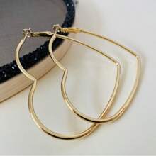 1 paire de boucles d'oreilles créoles géométriques en forme de cœur, convenant pour le port quotidien des femmes
