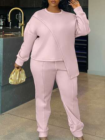 LovelyWholesale Plus Size Women's Casual Round Neck Long Sleeved Solid Color Asymmetrical Hem Top And Drawstring Sweatpants Set Spring And Autumn