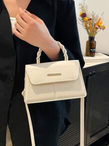 Un bolso cruzado de señora elegante y lujoso con accesorios de manija retorcida dorados, con una cartera decorativa multifuncional adecuada para fiestas de noche, reuniones, citas y como regalo navideño.