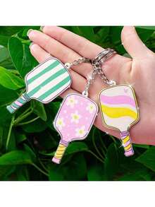 Móc khóa vợt Pickleball in họa tiết sọc và hoa nhiều màu sắc - Chất liệu kim loại bền chắc, phụ kiện túi thể thao đáng yêu, phù hợp với chìa khóa xe và túi xách, món quà hoàn hảo cho phụ kiện thể thao dành cho nam và nữ | Móc khóa vui nhộn | Móc khóa kim loại - Nhiều màu - Xem 1